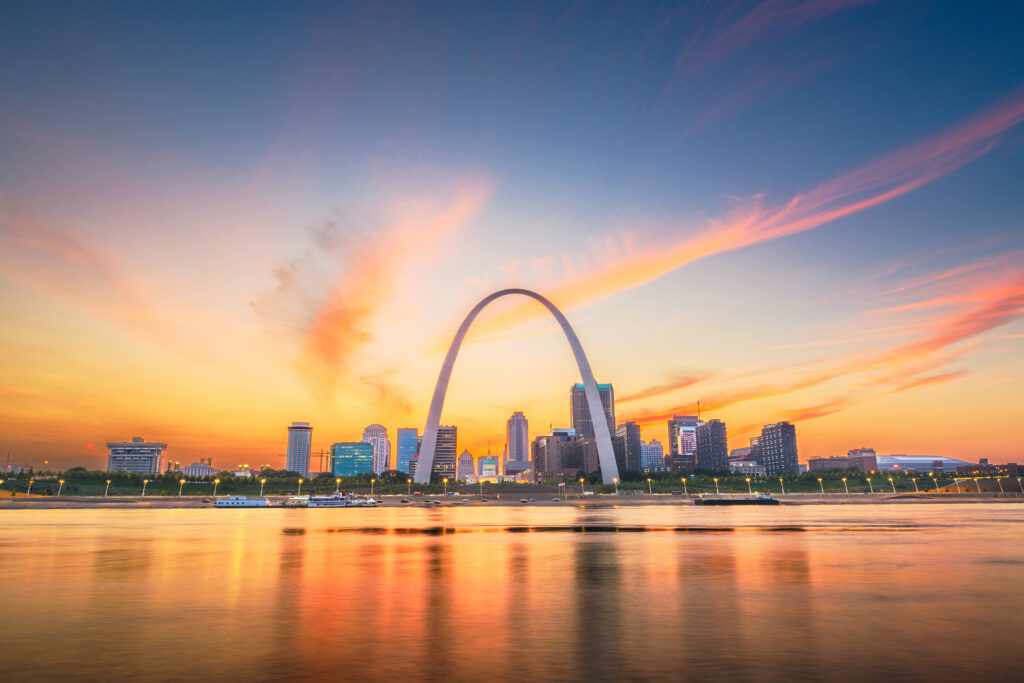 St. Louis, Missouri, USA downtown cityscape on the Mississippi River at twilight.